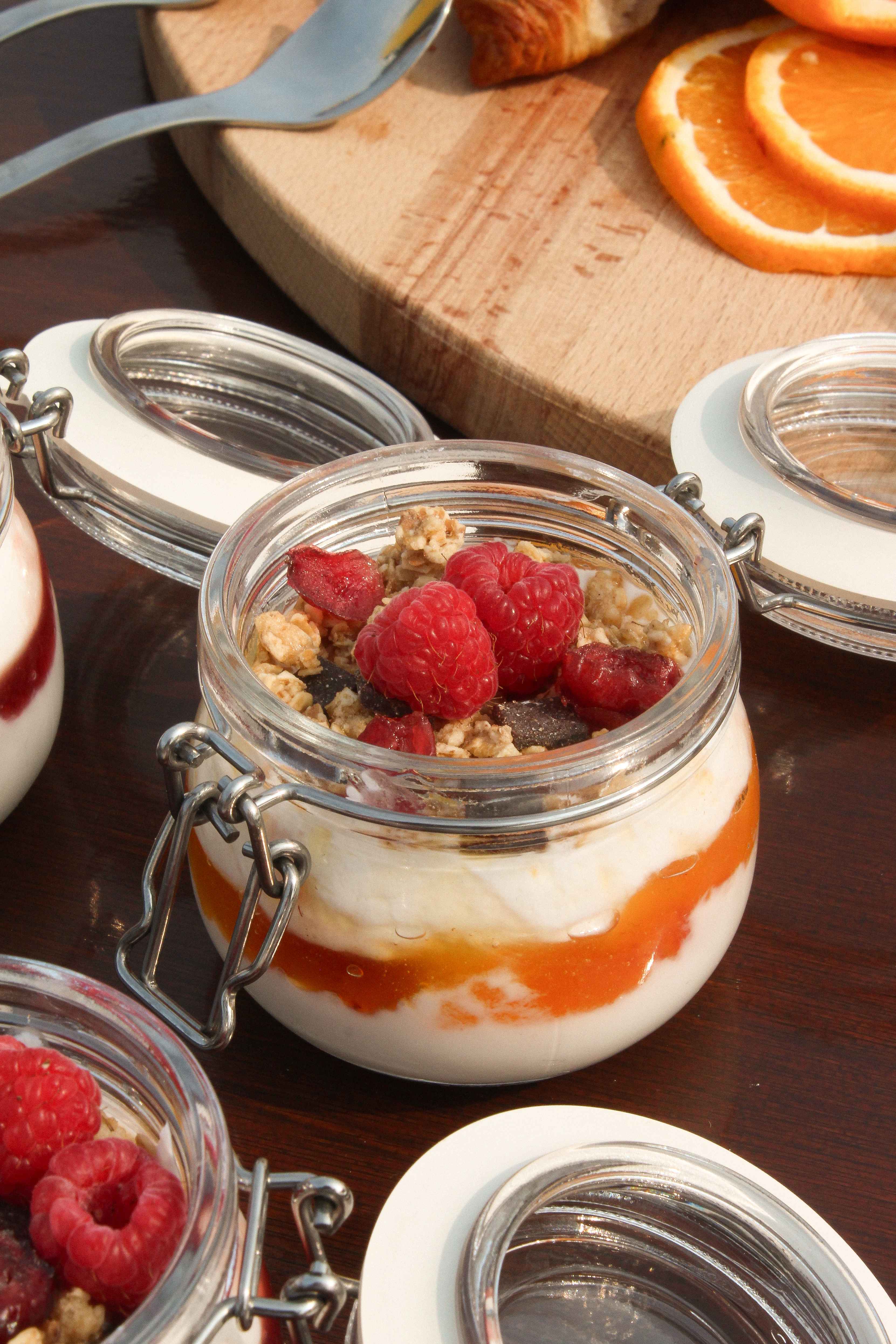 The Boat Café - Brunch & Breakfast boat with granola bowls, coffee and juices